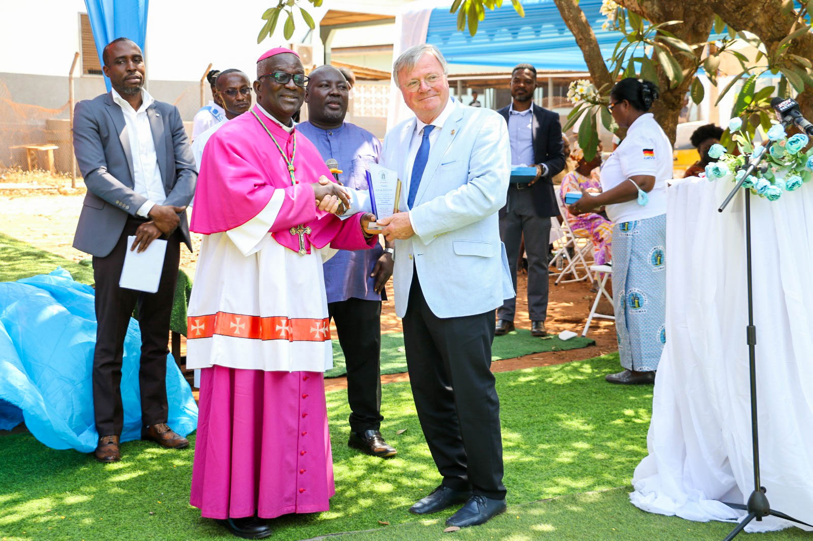 <p>GRVD partners receiving a plaque of honour at the commissioning of the Eye Centre</p>